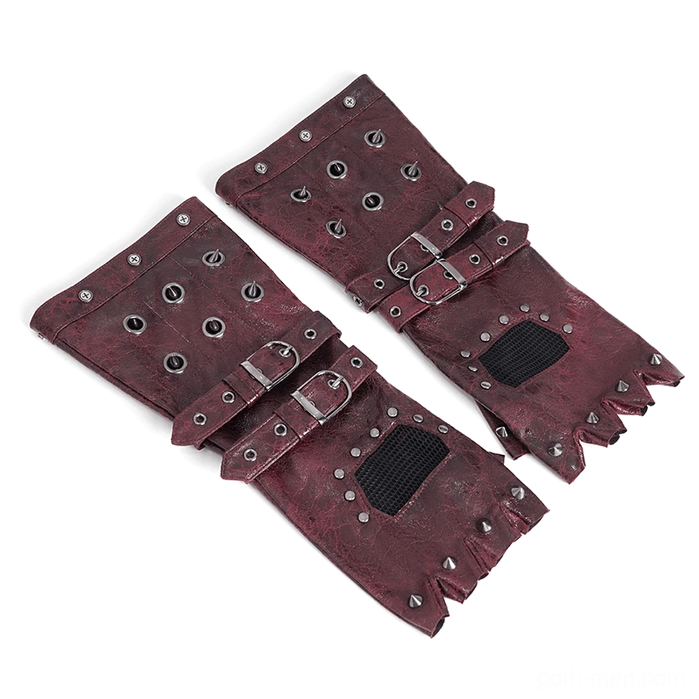 Top-down flat lay of gothic fingerless gloves displaying metal eyelets, buckle straps, and frayed finger edges with burgundy leather texture