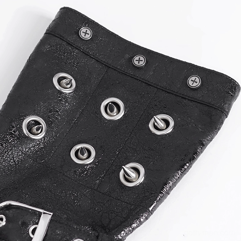 Extreme close-up detail of cracked black leather on gothic fingerless glove with cone spikes, metal eyelets, and screw fastener hardware