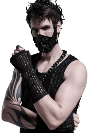 Black mesh fingerless gloves worn by tattooed male model with gothic styling and face mask in studio