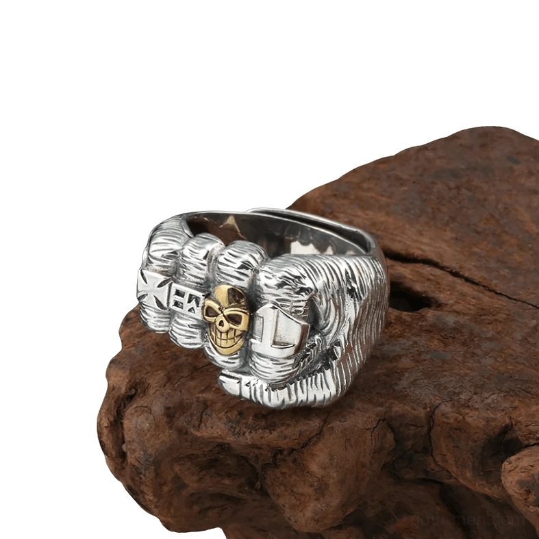 Two-tone gothic fist ring detailed engraved texture front side perspective metal craft
