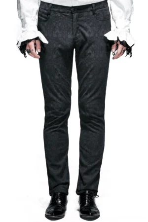 Black gothic fitted straight trousers front view on male model, showing structured silhouette with zipper fly and jacquard weave detail