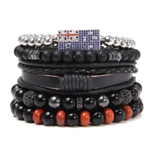 Gothic multi-layer charm bracelet with flag pendant featuring black braided leather bands and red natural stone beads, front studio view