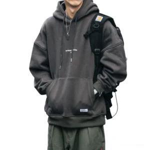 Men's dark gray gothic oversized fleece hoodie with drawstring hood and kangaroo pocket, front casual view