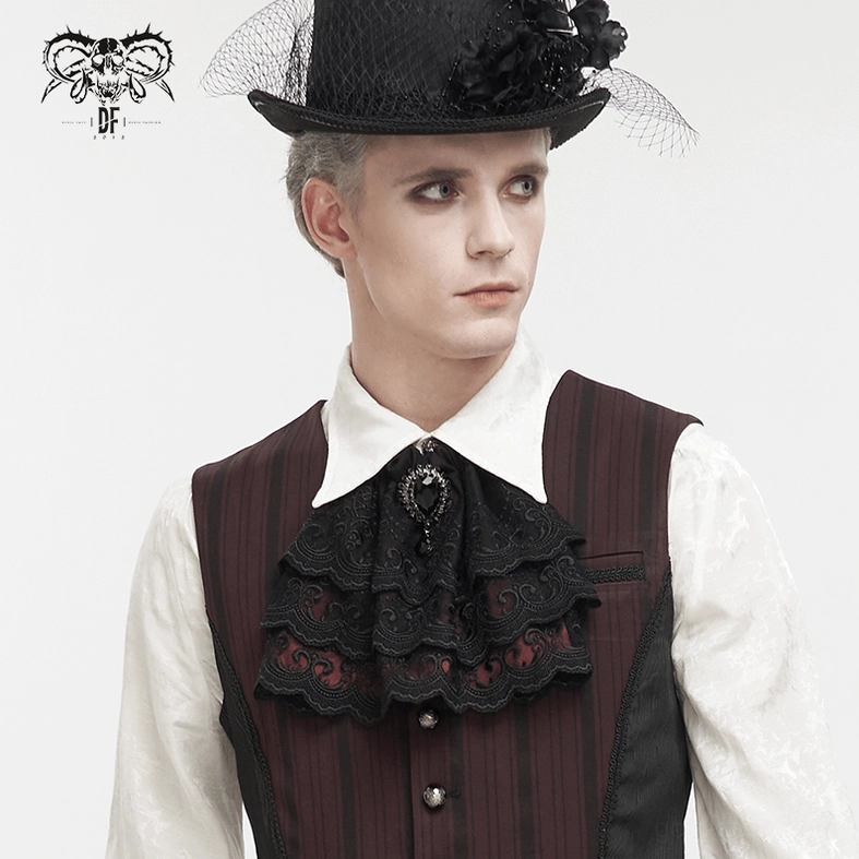 Male model styled in full gothic formal attire with black lace cravat, matching top hat with veil, half-body front view