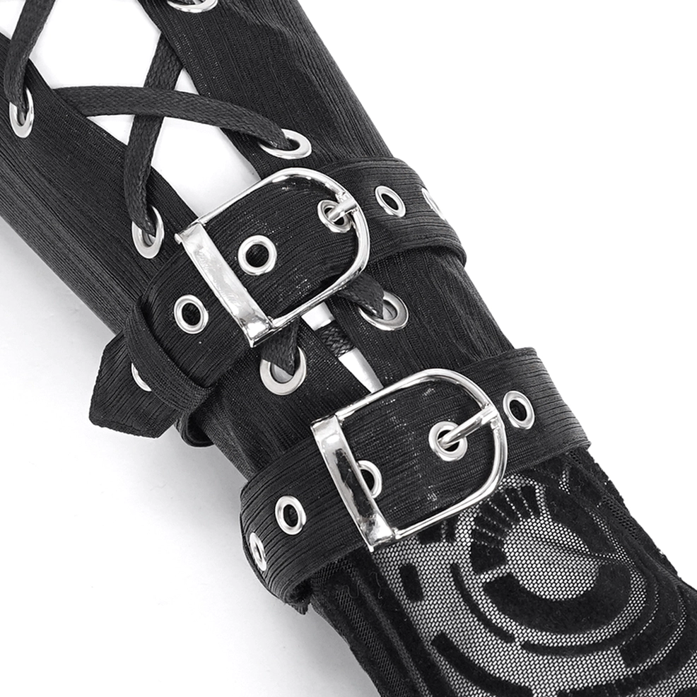 Close-up macro view of gothic arm gauntlet hardware showing silver buckles, lace eyelets, and cyber fabric pattern