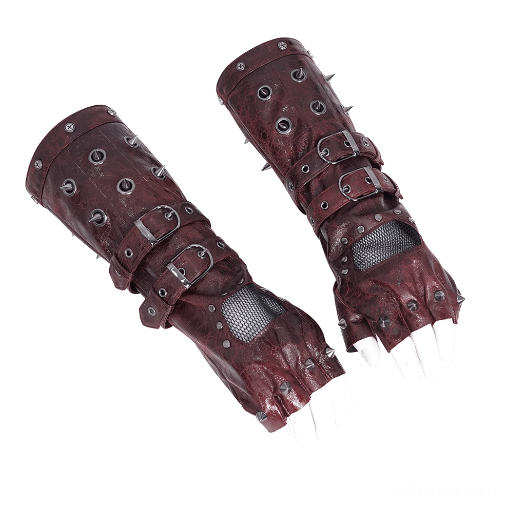 Pair of black and burgundy gothic studded gauntlet gloves flat lay top-down view showing metal buckles, rivets, and mesh inset panels