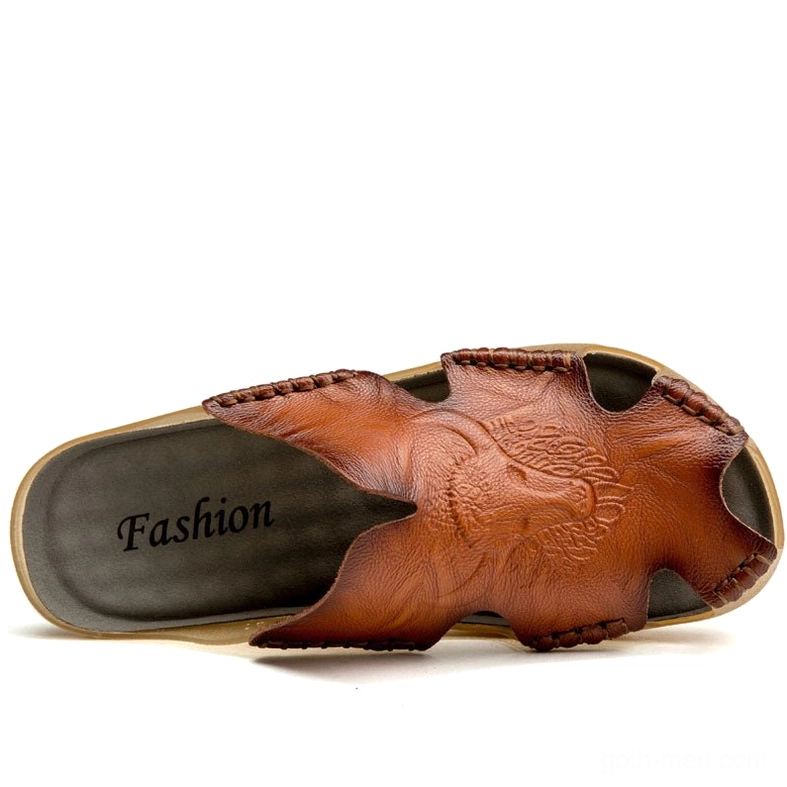 Gothic men's leather slide sandals with geometric cutout patterns and alternative fashion aesthetic