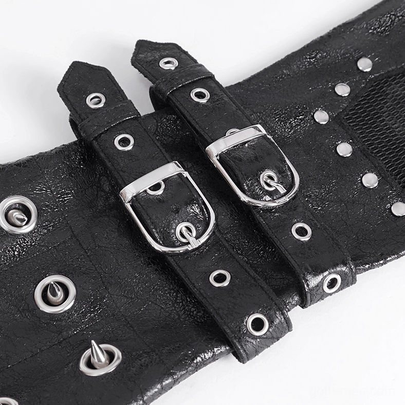 Detailed close-up view of gothic glove hardware including black leather base, metal buckles, surgical eyelets, and cone spike fasteners