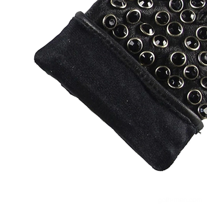 Close-up detail of gothic fingerless glove showing suede wrist cuff and round metal rivet embellishment