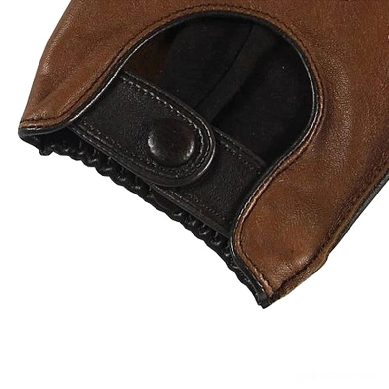 Detailed view of leather biker glove wrist button strap with elastic band and hardware accent in tan brown genuine goatskin