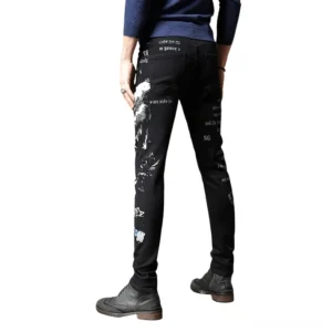 Black gothic graffiti slim jeans rear full-body shot showing back waist and leg prints