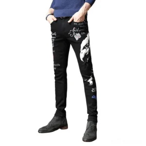 Men's black gothic graffiti slim jeans front full-body view with intricate print details