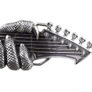 Vintage silver eagle claw guitar head buckle close-up with scaled texture and skull details on tuning pegs