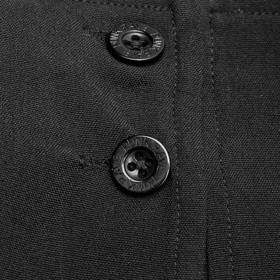Macro detail shot of black gothic hakama pants fabric texture, embossed branded buttons, tight woven material, and precise stitching