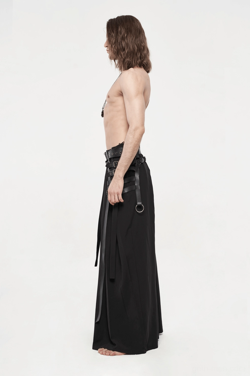 Black gothic hakama pants styling detail showing hem width, drape quality, and fabric fall from wide leg opening