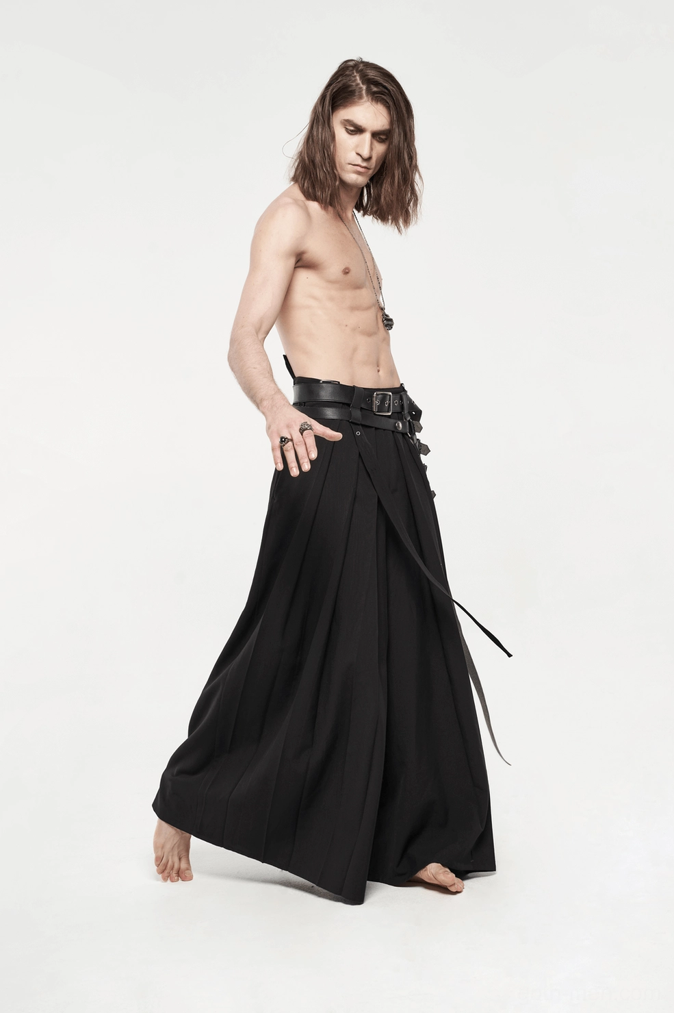 Black gothic hakama pants waist hardware system featuring multiple leather straps, square buckles, and adjustable fastening mechanism
