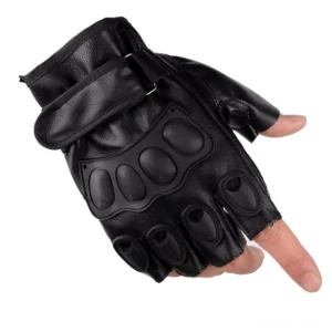 Black gothic half-finger tactical gloves with padded knuckle guards and wrist fastener strap, side 3/4 view