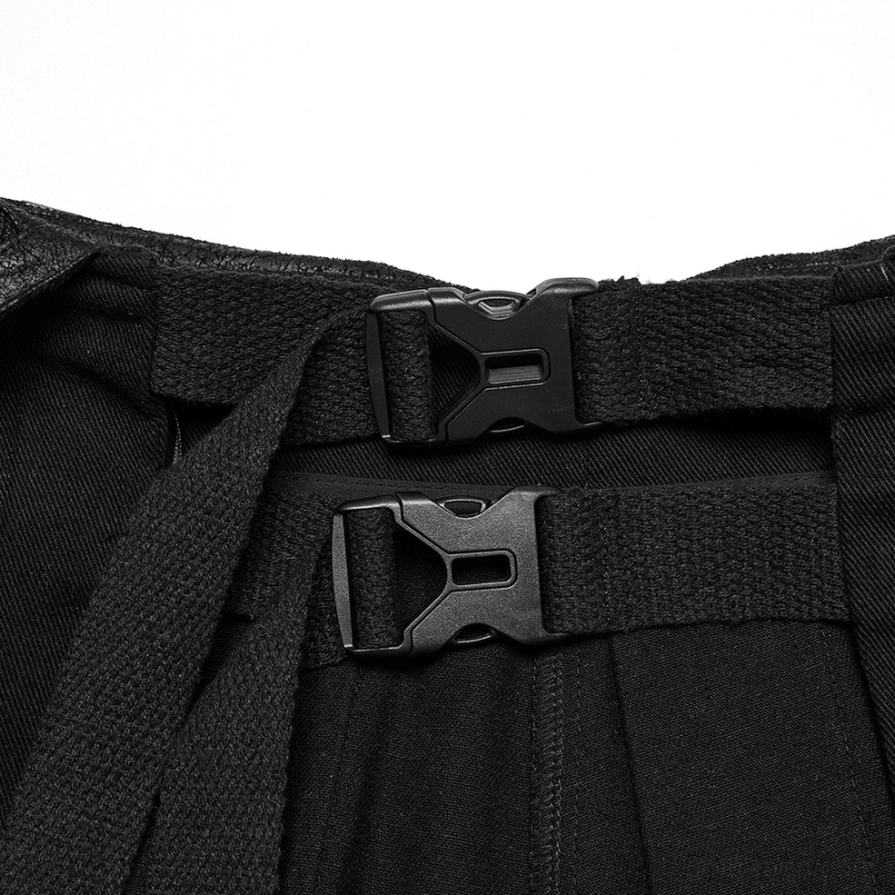 Close-up of heavy-duty plastic quick-release buckles and black webbing straps on gothic half skirt