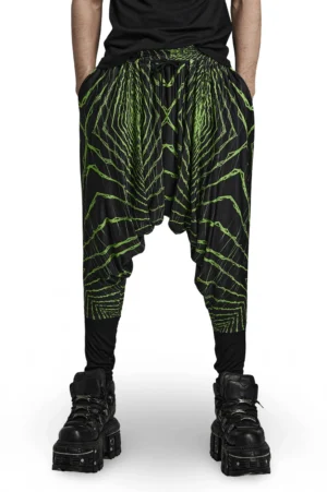 Geometric neon gothic harem pants front view with drop-crotch silhouette and black-green angular print