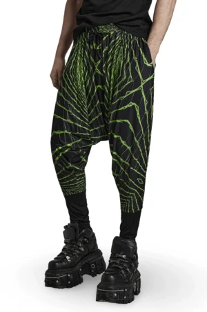 Gothic harem pants three-quarter side view showing elastic waist and fitted ankle cuffs worn with platform boots