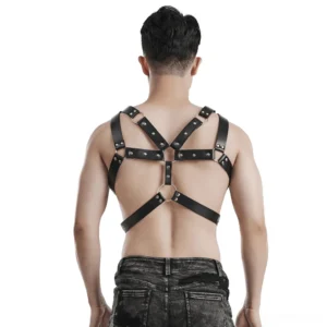 Black leather harness back view displaying open crisscross design with central metal O-ring and rear straps