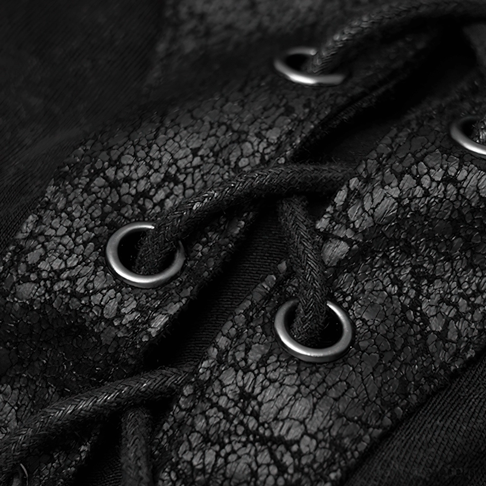 Close-up metal hardware accents o-ring d-ring fittings studded black leather straps rope laces