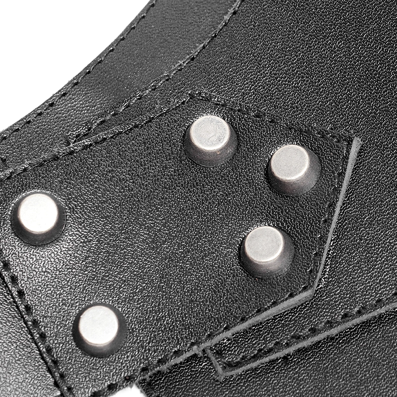 Macro shot of shoulder armor spike studs showing metal spike hardware and precision stitching
