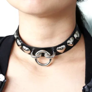 Black PU leather heart choker with silver metal studs worn on female neck, close-up styling showcase of gothic choker necklace