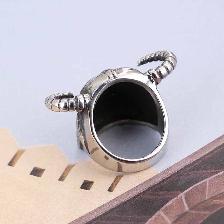 Gothic warrior helmet ring back view - smooth silver inner band with prominent horned exterior design