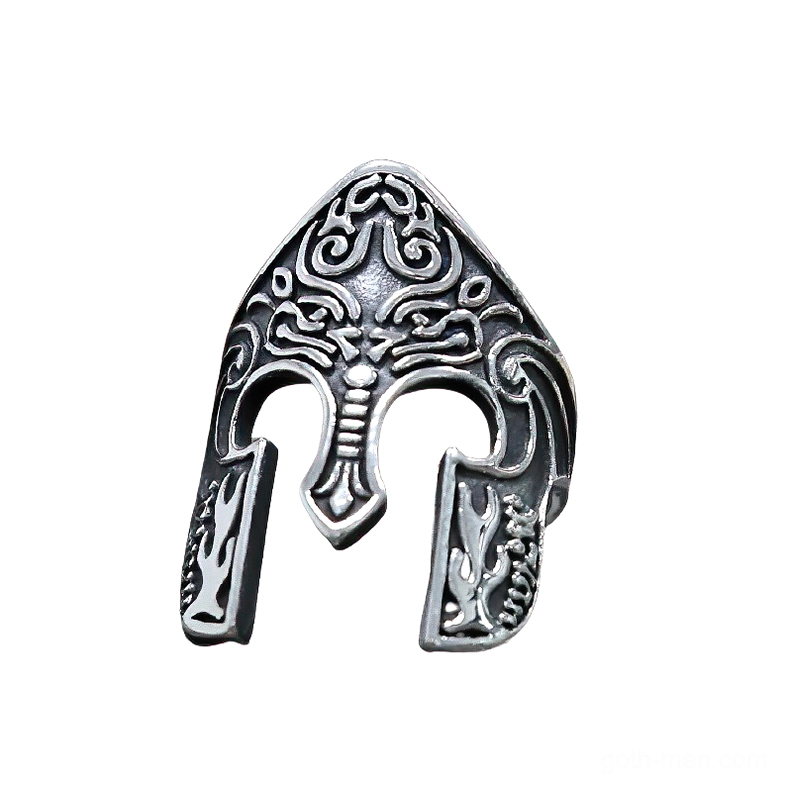 Aged silver gothic warrior helmet ring with dark patina and detailed mythical engravings, tilted angle