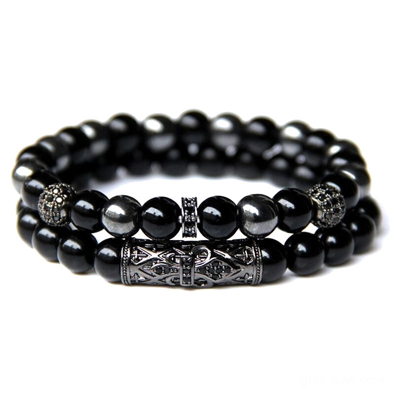 Luxury gothic beaded bracelet with hematite stones, pavé crystal charm ball, and carved black metal band accents