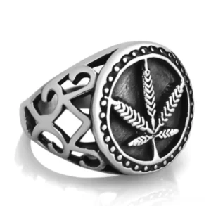 Vintage biker hemp leaf ring side angle showing black enamel inlay and scrollwork band details