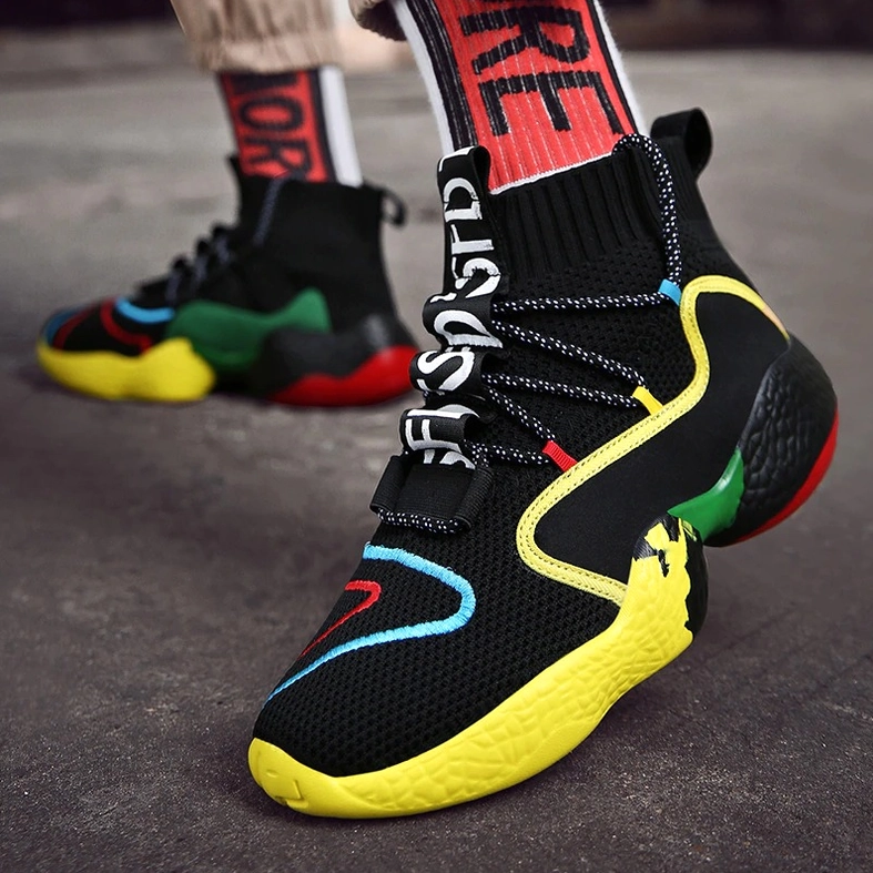 Gothic high-top sneaker with embossed lettering and distinctive colorful outsole design statement piece