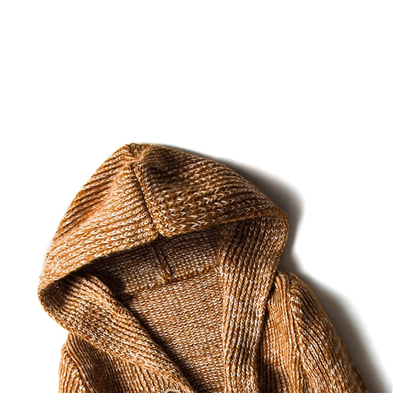 Close-up detail of tan marled chunky knit texture on gothic hooded sweater fabric
