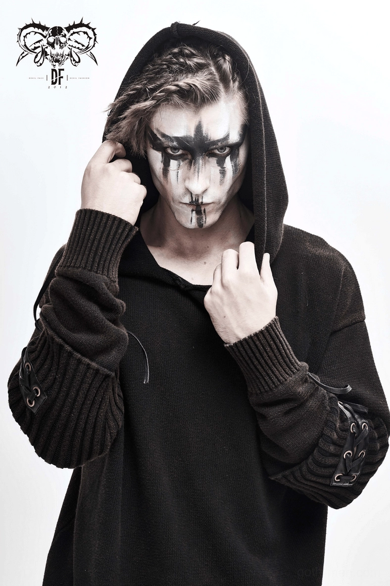 Detailed close-up view of lace-up rivet embellishments on sleeves of black gothic hooded sweater, showing craftsmanship