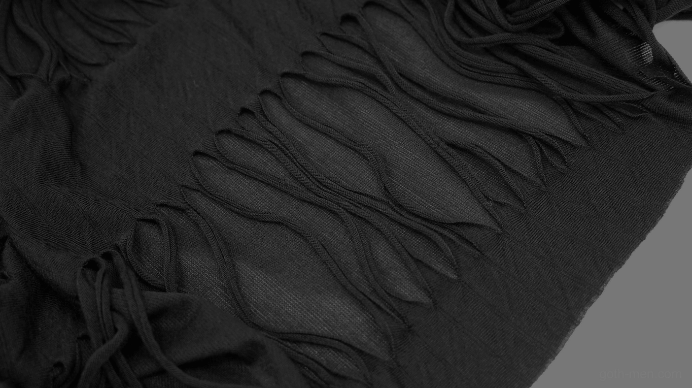 Gothic hoodie tassel fabric texture detail, black frayed knit material close-up, artisan finishing