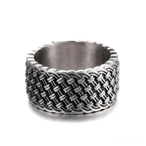 Front flat view of gothic stainless steel ring displaying full interwoven pattern and brushed inner band