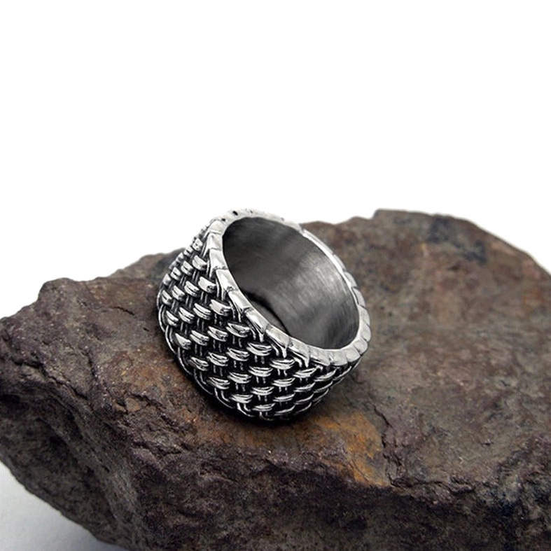 Overhead view of gothic interwoven ring showcasing full woven face design and vintage silver finish