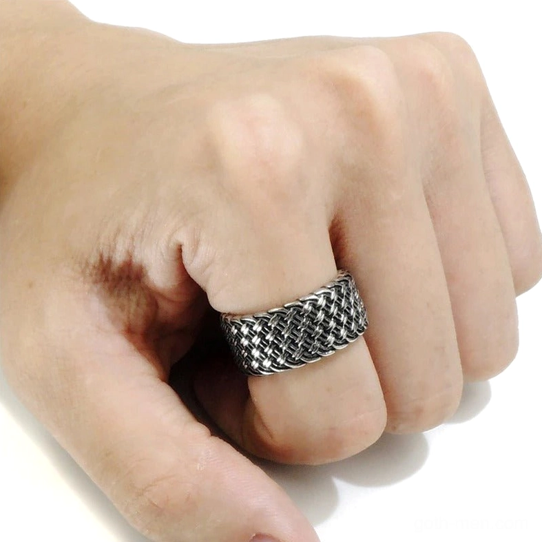 Gothic stainless steel interwoven ring worn on male hand showing practical fit and vintage silver tone
