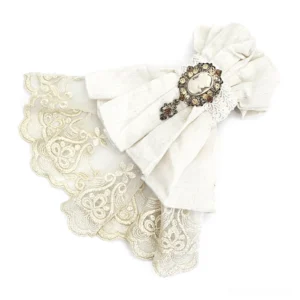 Vintage Cameo Brooch and Embroidered Lace Detail of Gothic Jabot - Top-Down Close-Up