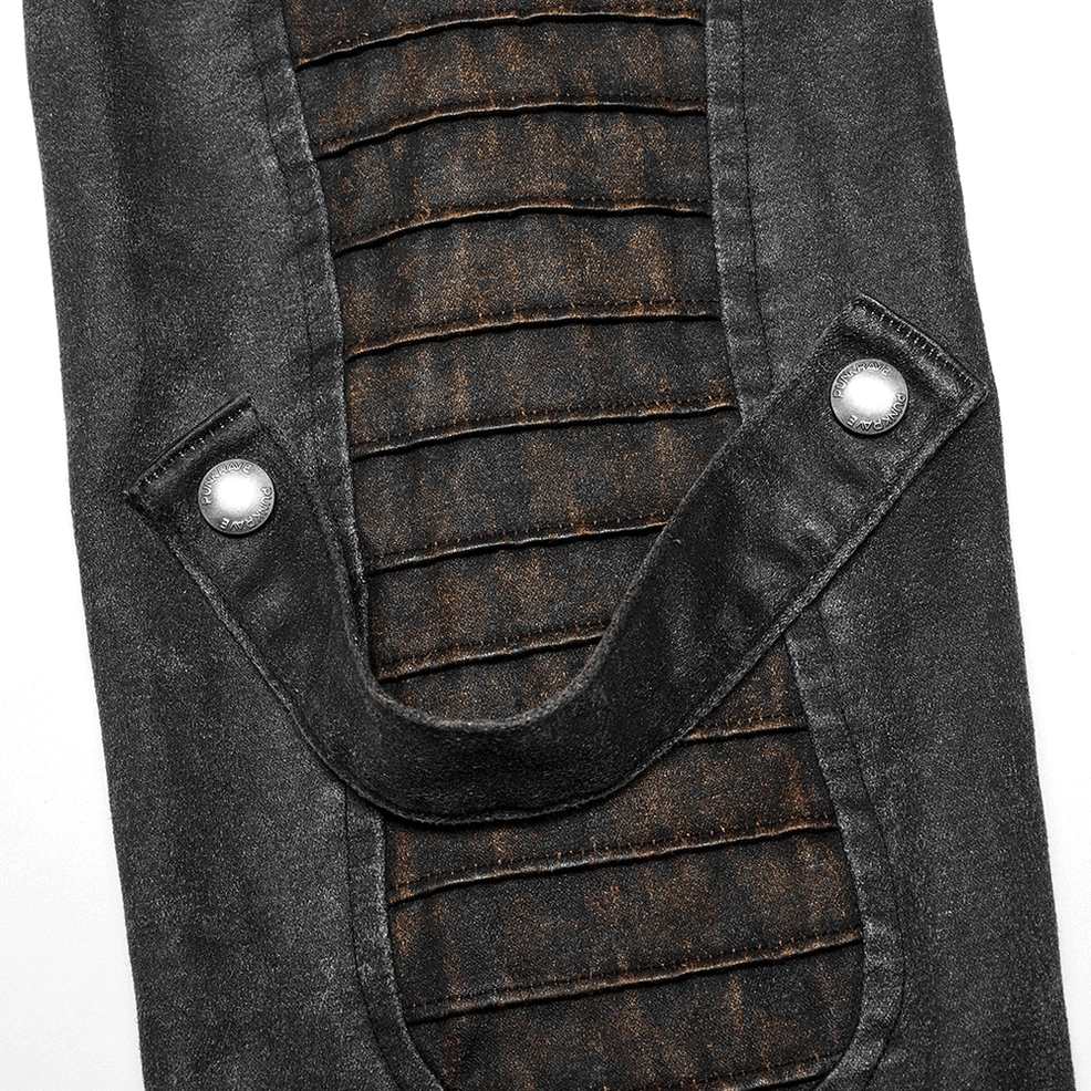 Gothic jacket sleeve strap adjustment hardware and reinforced stitching architectural detail