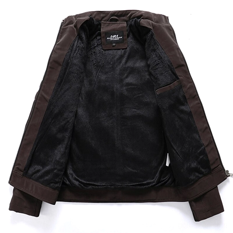 Inner lining detail of brown gothic biker jacket showing black fleece and brand label