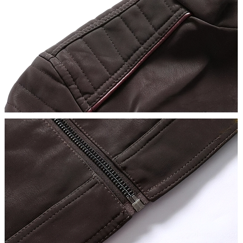 Close-up macro detail of brown PU leather gothic jacket showing texture, metal zippers and quilted red stripe