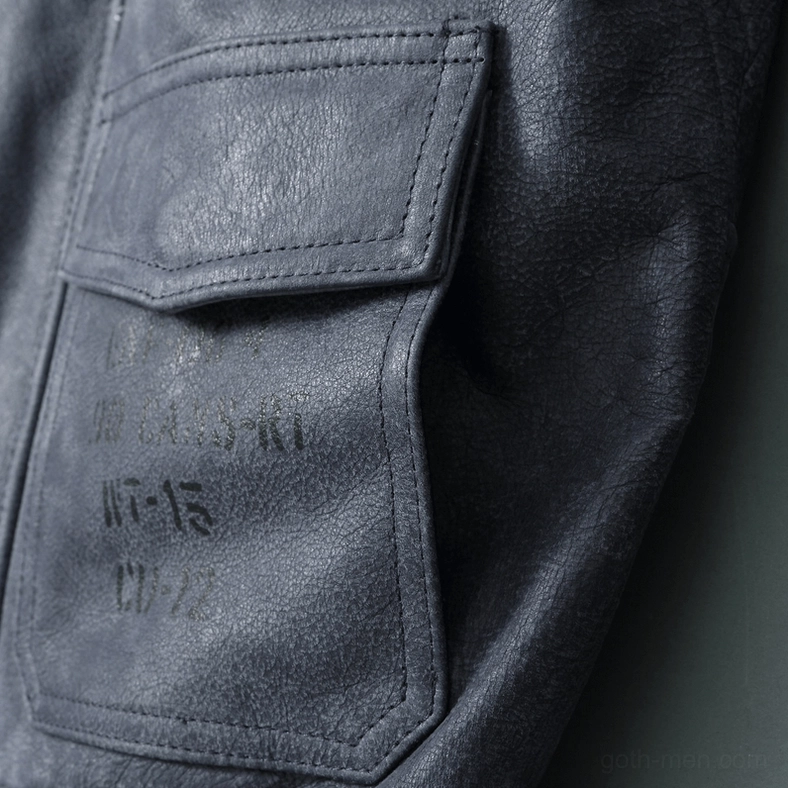 Gothic embroidered leather jacket showing turn-down collar and ribbed cuff detail photography