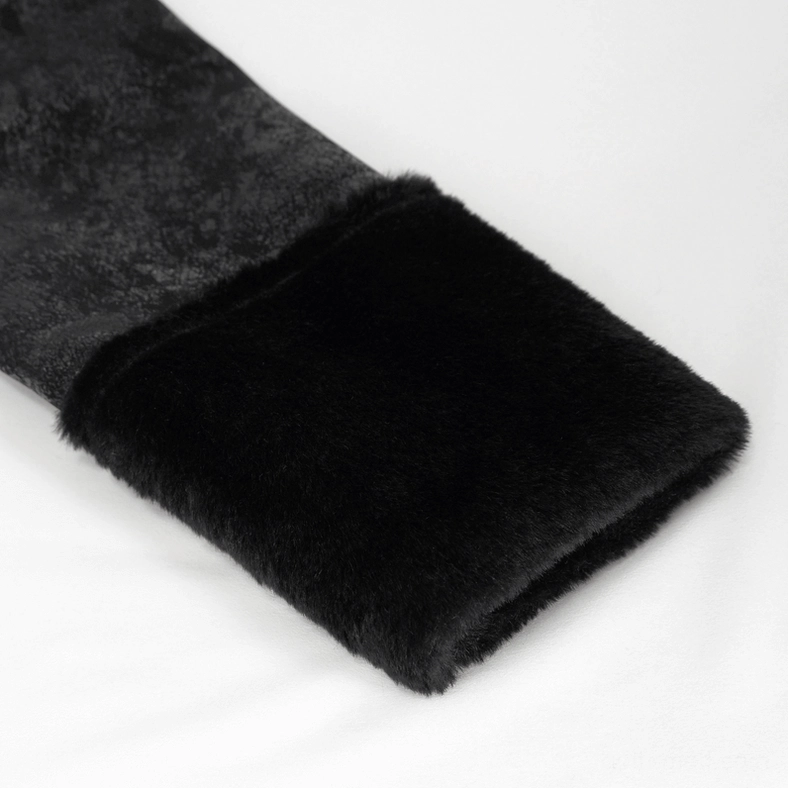 Close-up of faux fur cuff trim detail on black gothic jacket sleeve