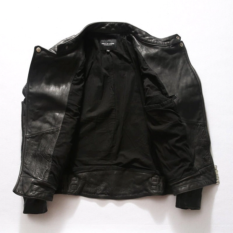 Black leather gothic jacket interior flat lay display showing full cotton lining and brand construction quality