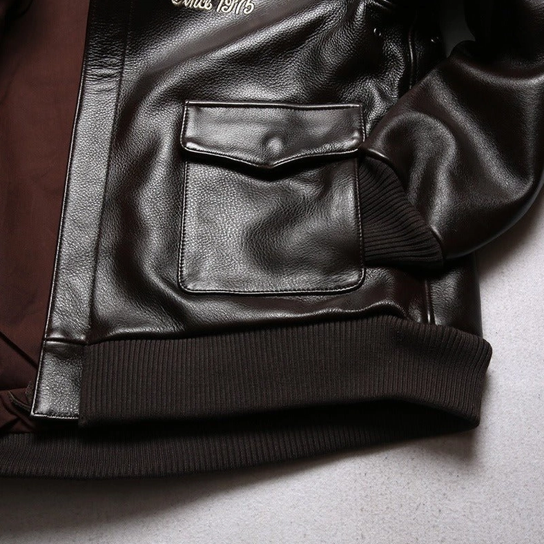 Gothic leather jacket interior pocket and lining details showcasing hidden brand label and polyester quality