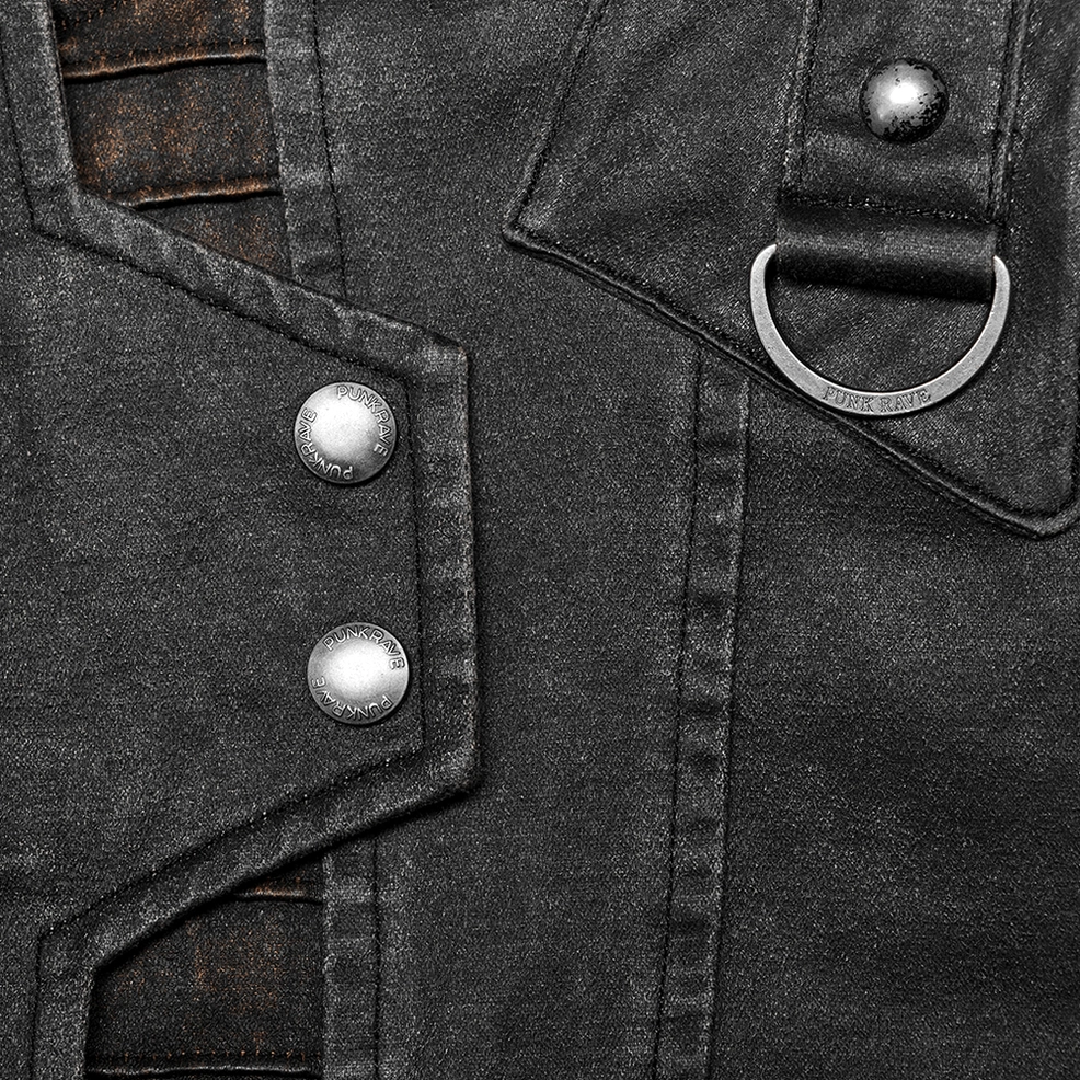 Detailed close-up of gothic leather jacket snap closure hardware on distressed faux leather