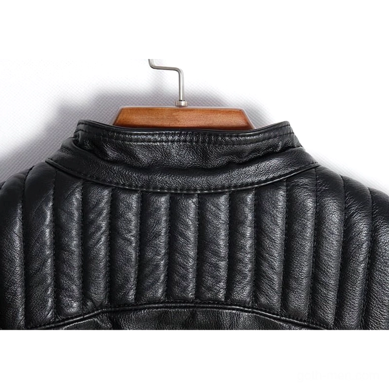 Close-up of black leather motorcycle jacket back showing vertical quilted upper stitching and stand collar