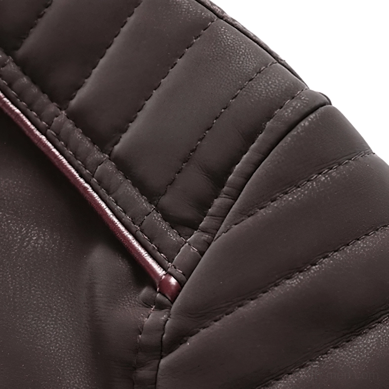 Quilted PU leather texture detail of gothic biker jacket showing precision stitching and dimensional padding construction